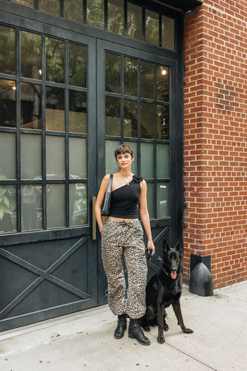 Supermodel Taylor Hill with her black German Shepherd dog Salem